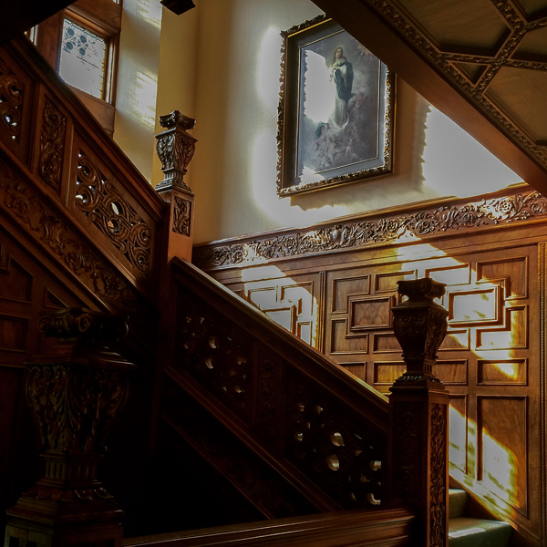 The grand staircase inside Leary Mansion (Olympia Archdiocese) on Capitol Hill, Seattle, as seen in Rose Red.
