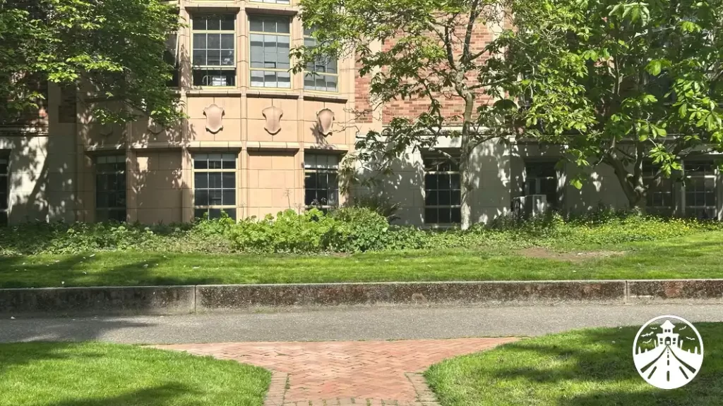 Present-day photo from the group’s perspective outside the University of Washington music school, recreating the shot from Rose Red.